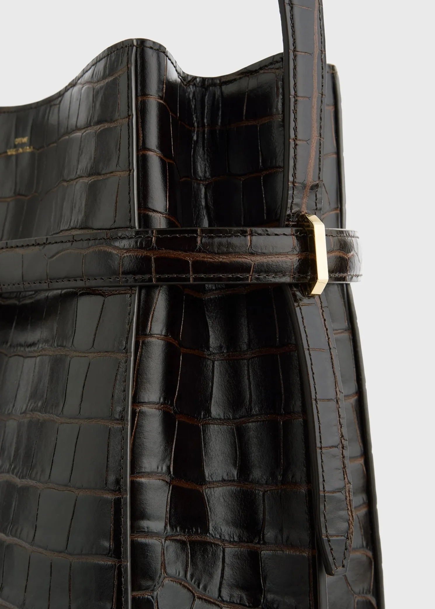 Belted croco-embossed bucket bag dark brown