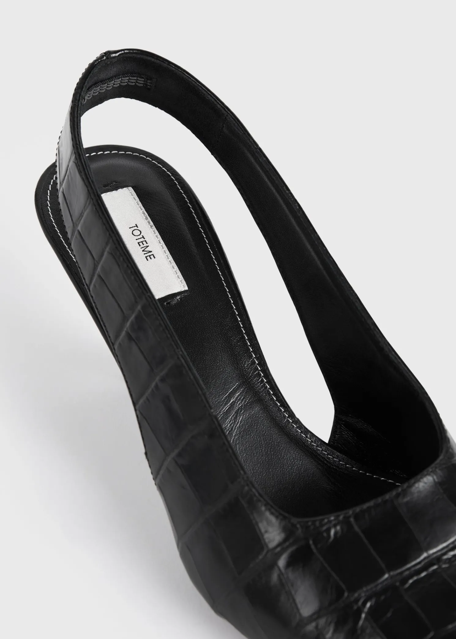 Classic croco-embossed slingbacks black