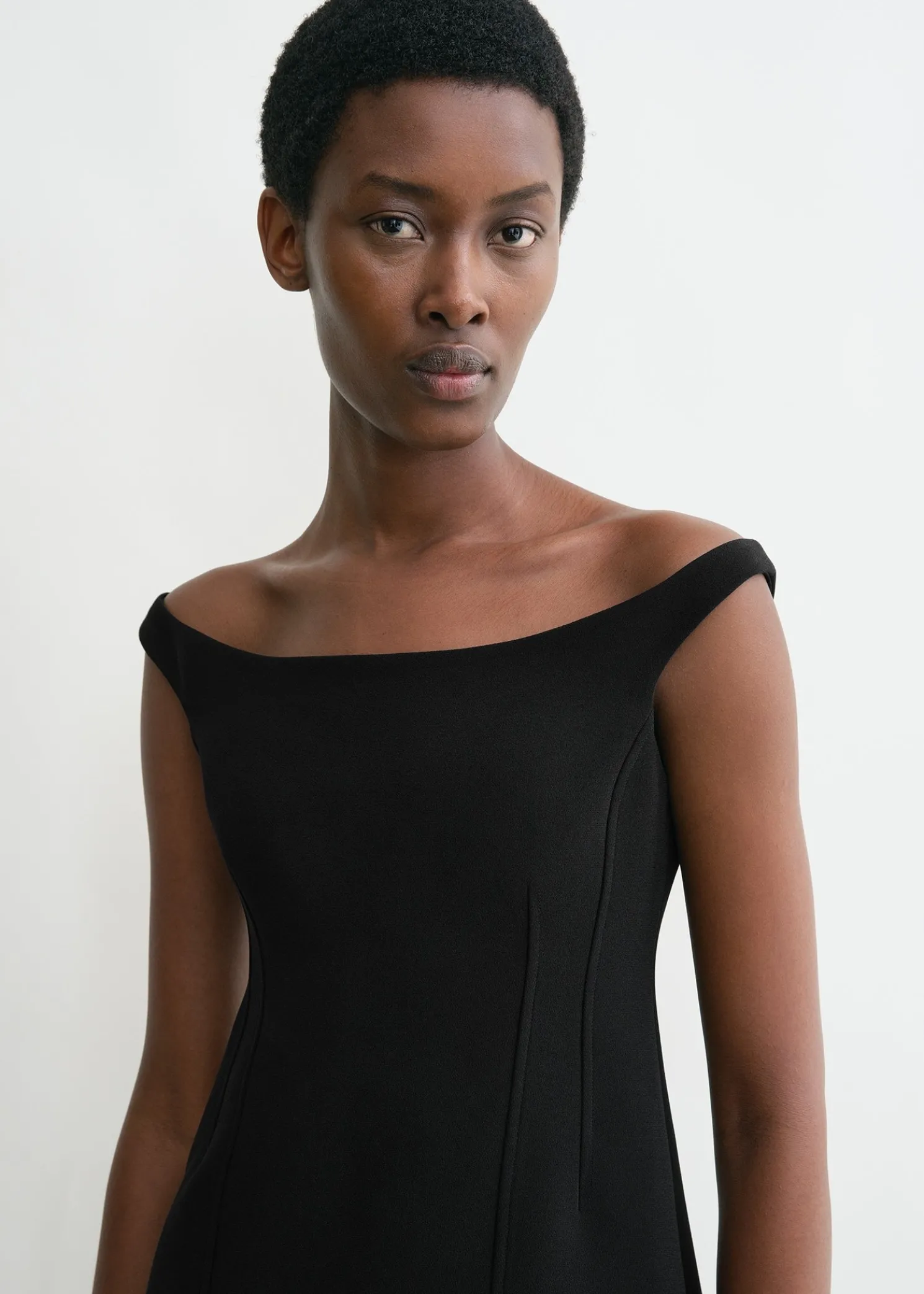 Curved off-shoulder top black