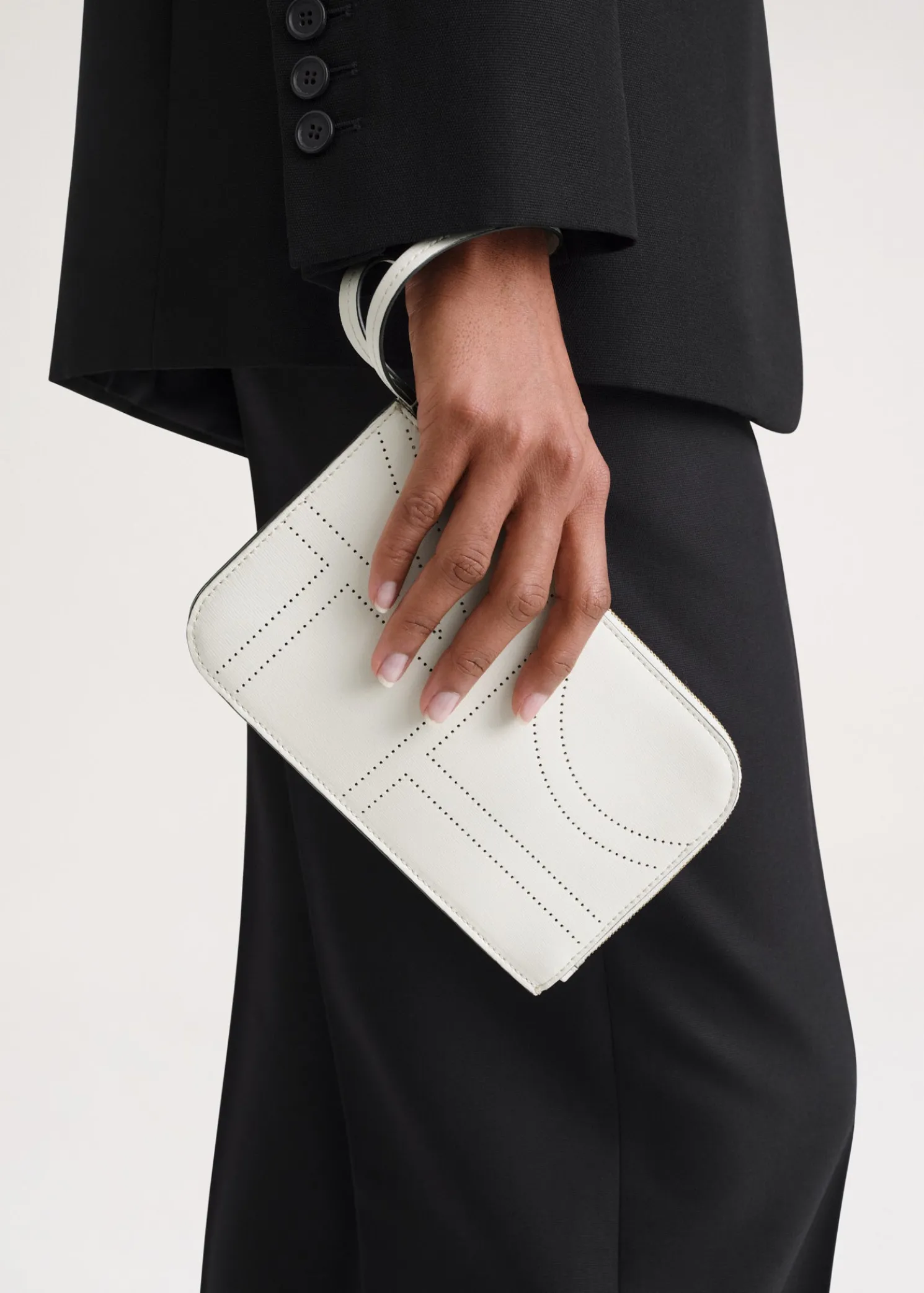 Monogram leather wristlet pouch milk