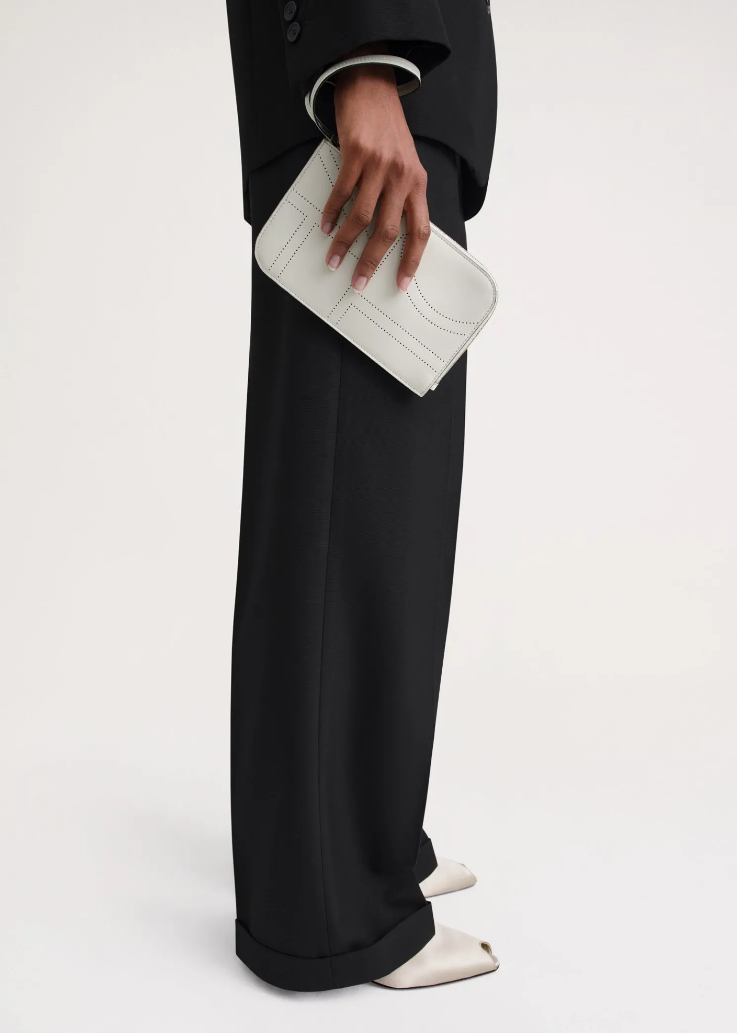 Monogram leather wristlet pouch milk