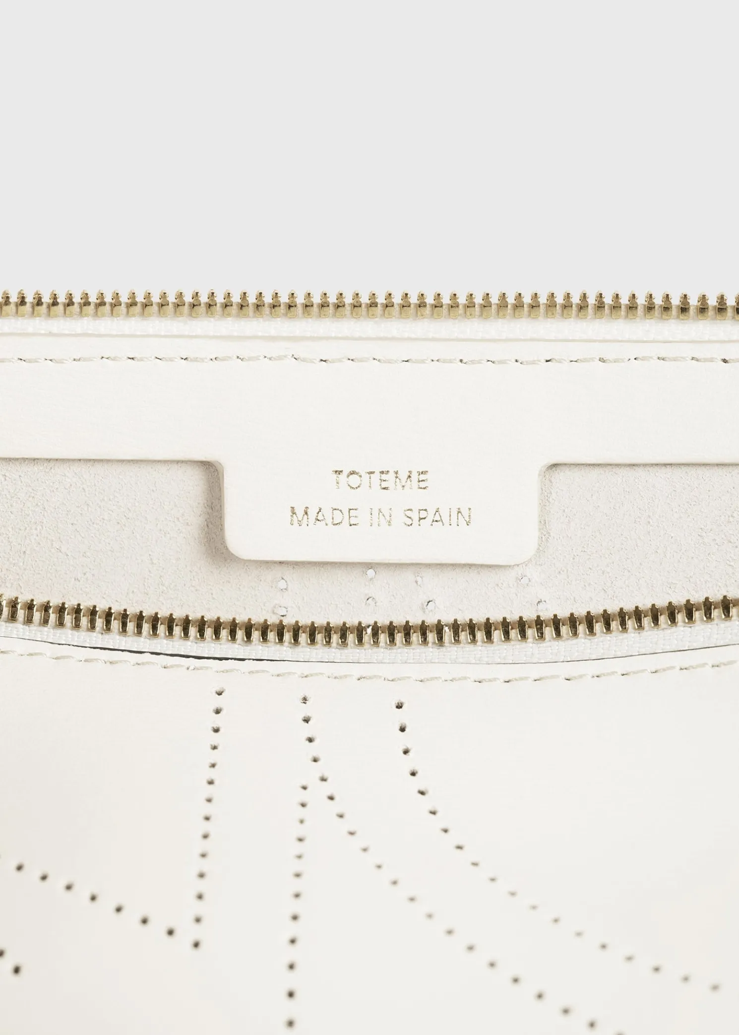 Monogram leather wristlet pouch milk