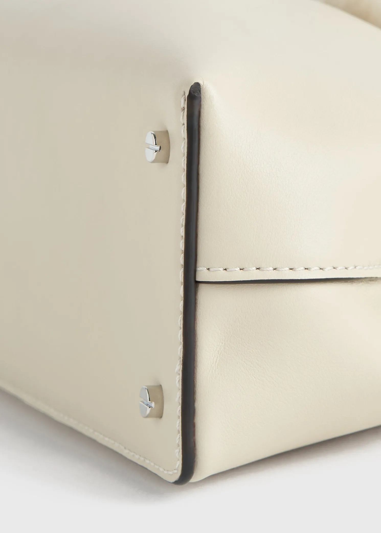 Shearling T-Lock clutch ecru