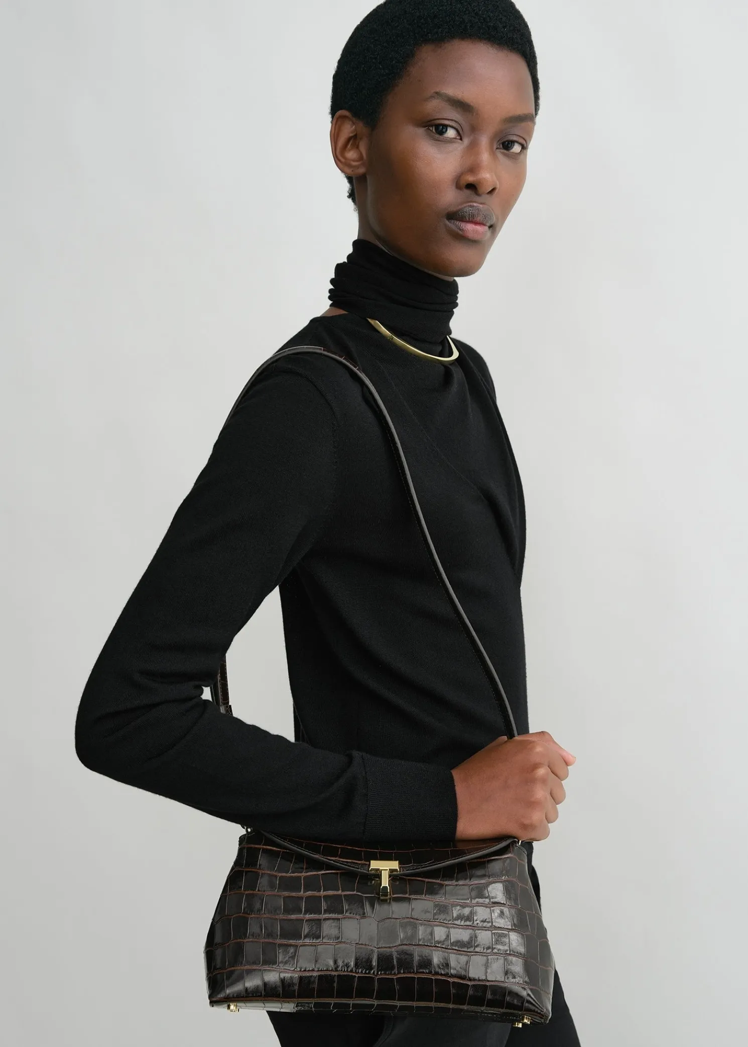 T-Lock croco-embossed clutch dark brown