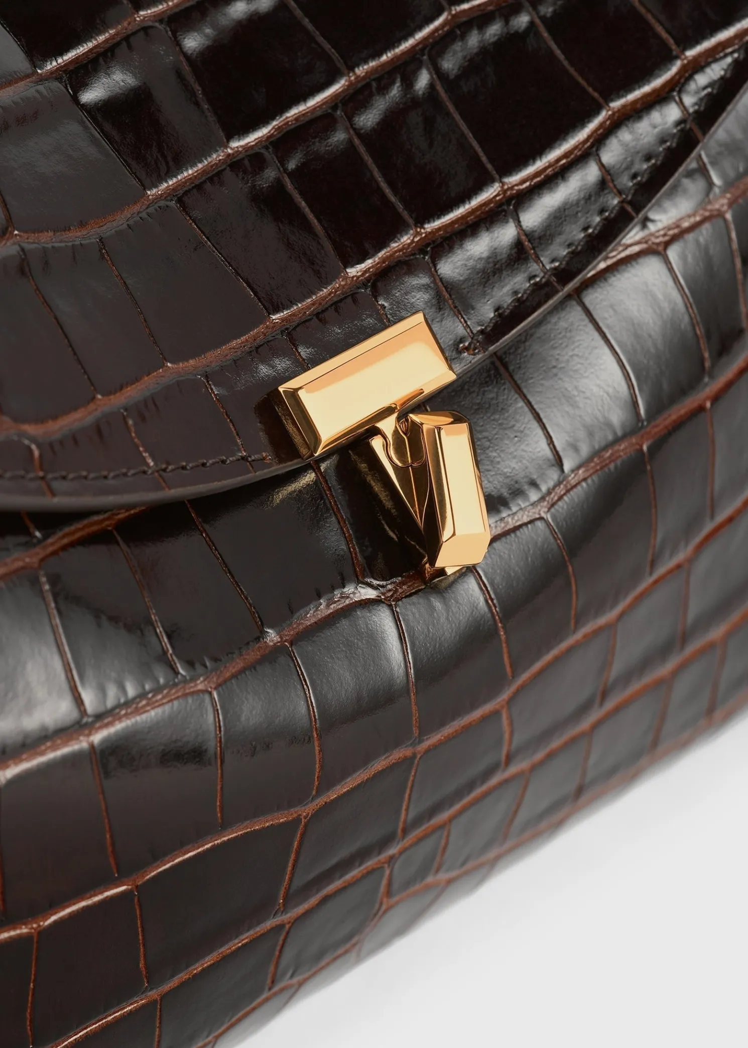 T-Lock croco-embossed clutch dark brown