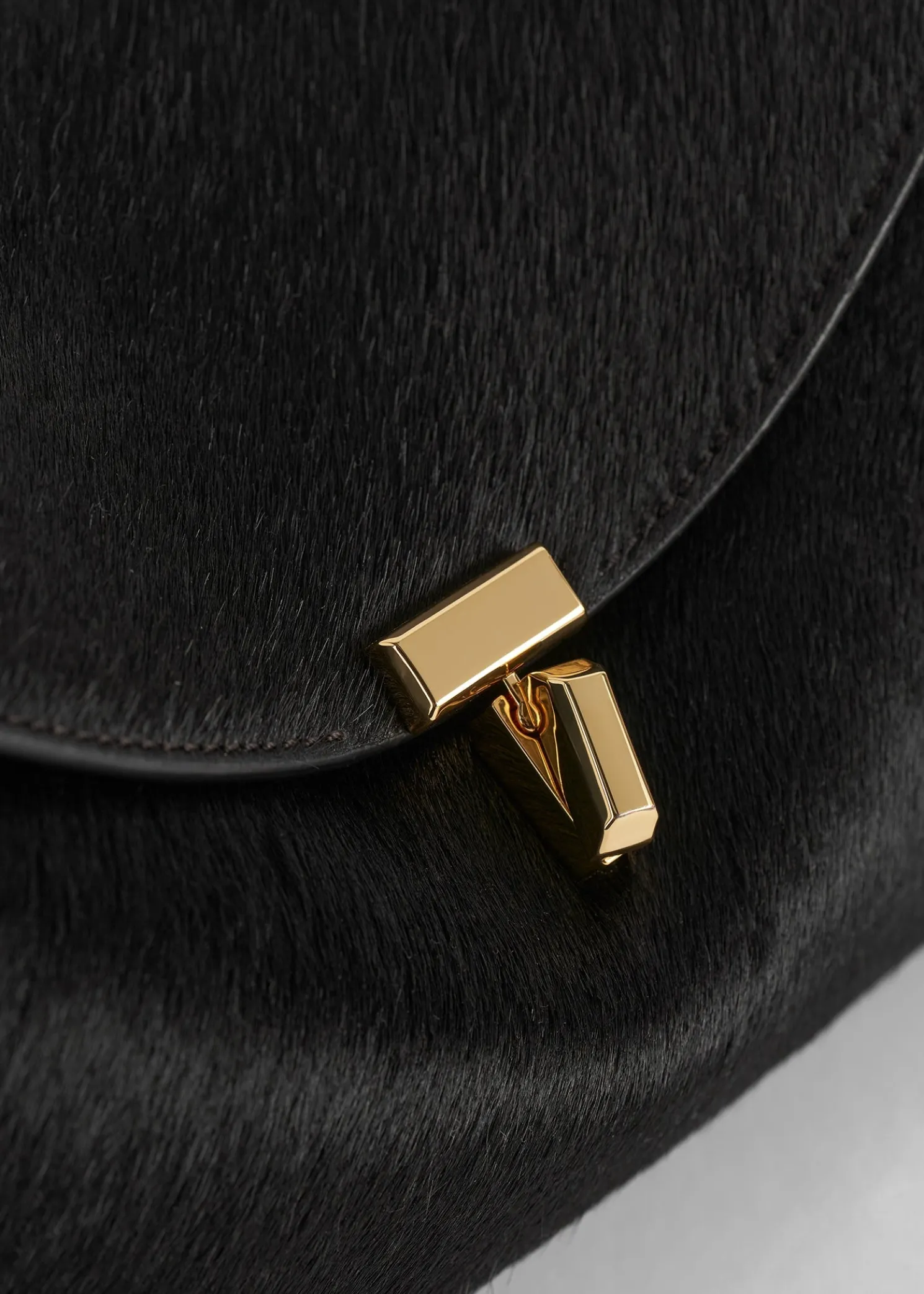 T-Lock pony hair clutch black