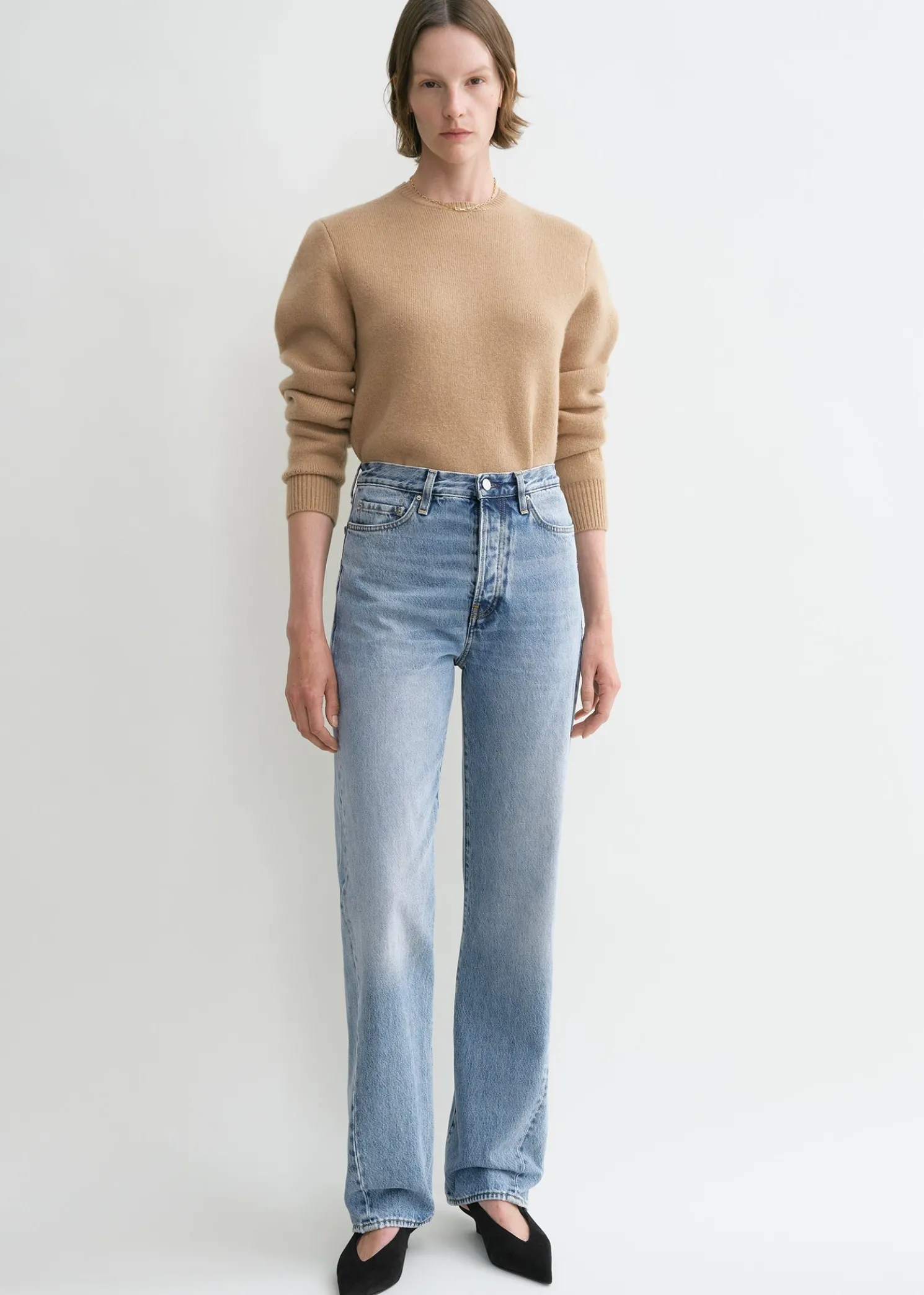 Twisted seam denim full length worn blue