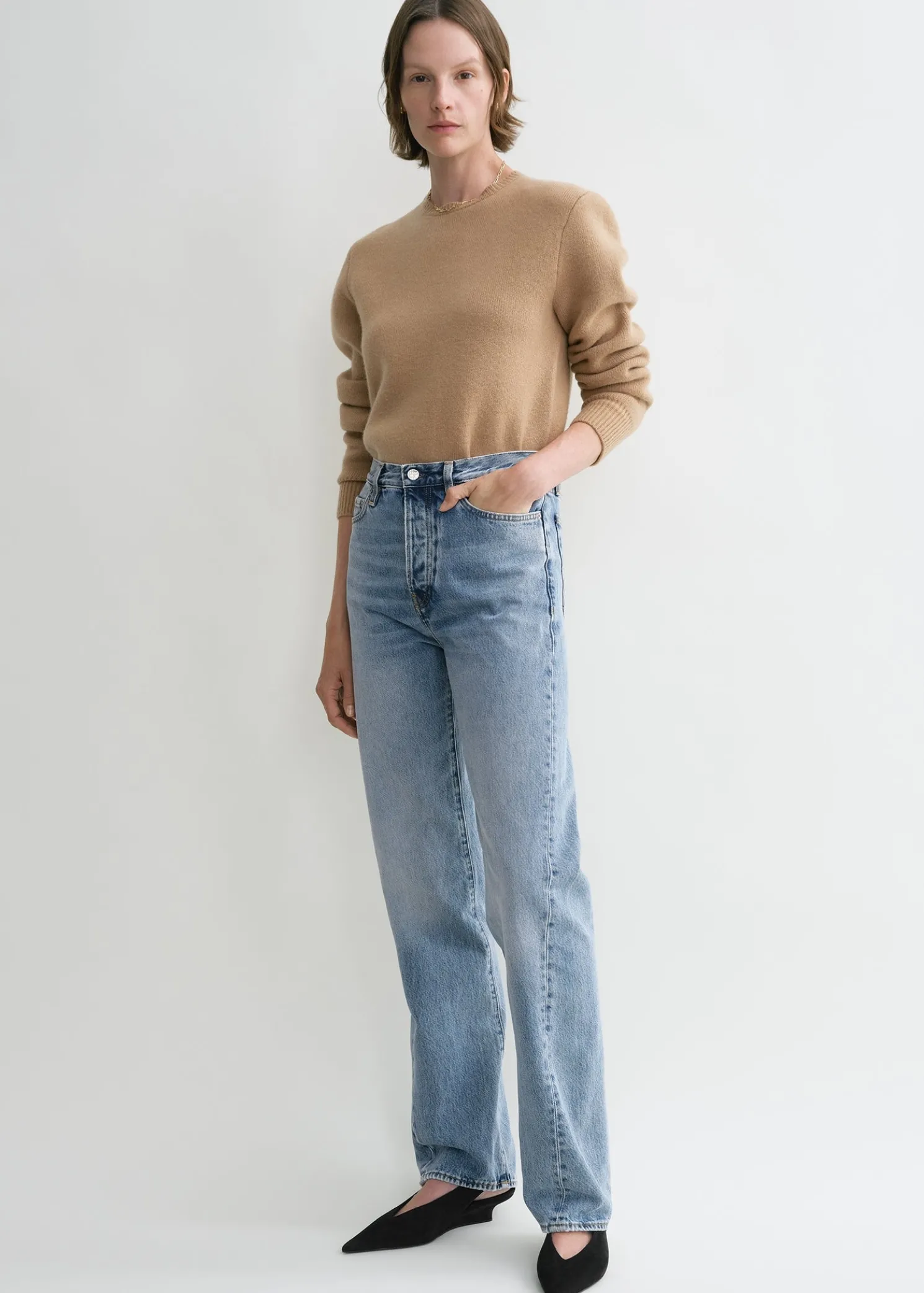 Twisted seam denim full length worn blue