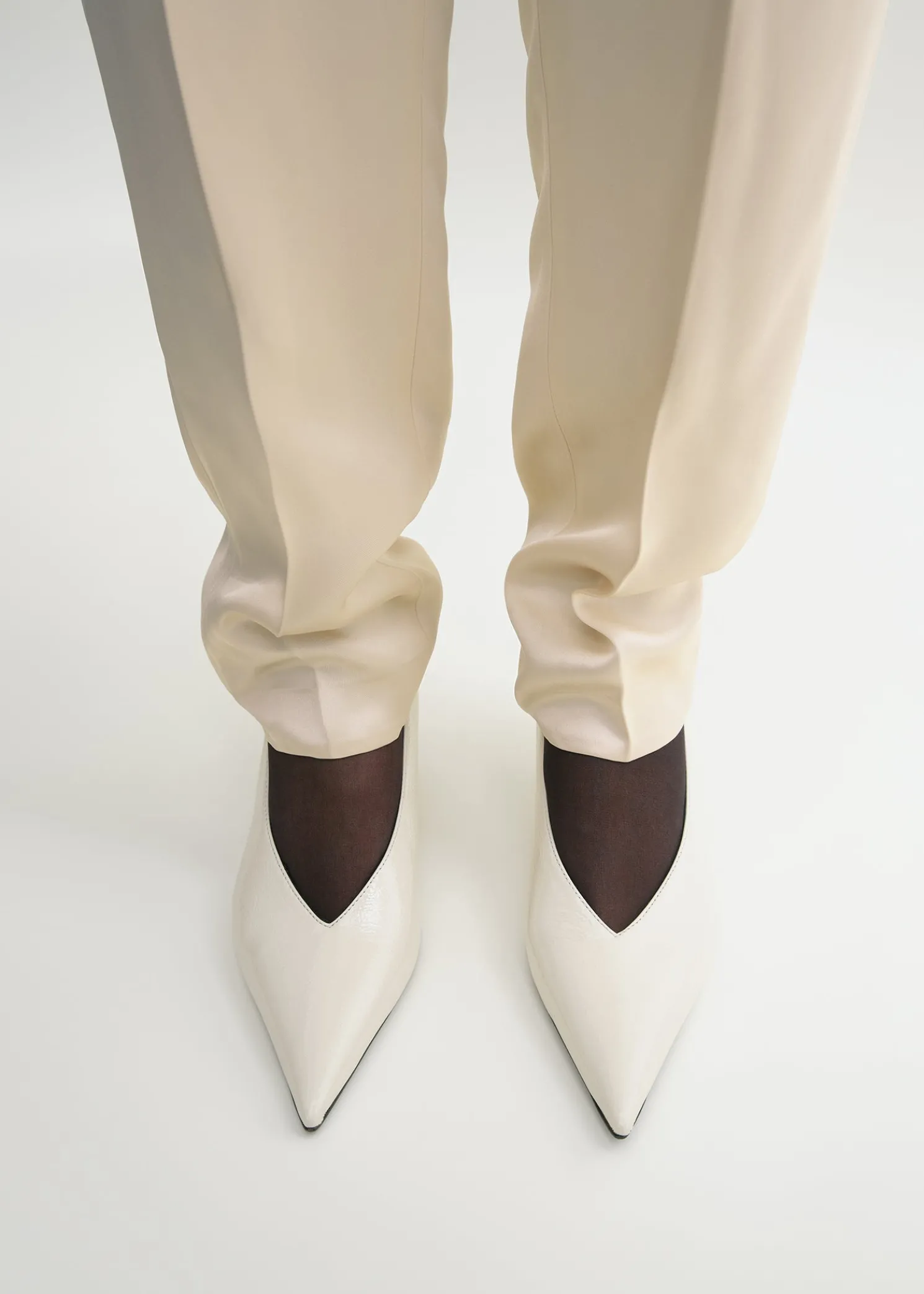 Wedge-heel Naplack pumps bleached sand